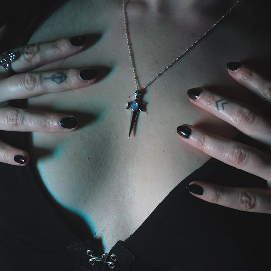 Roniit modeling silver and moonstone I Choose Me necklace