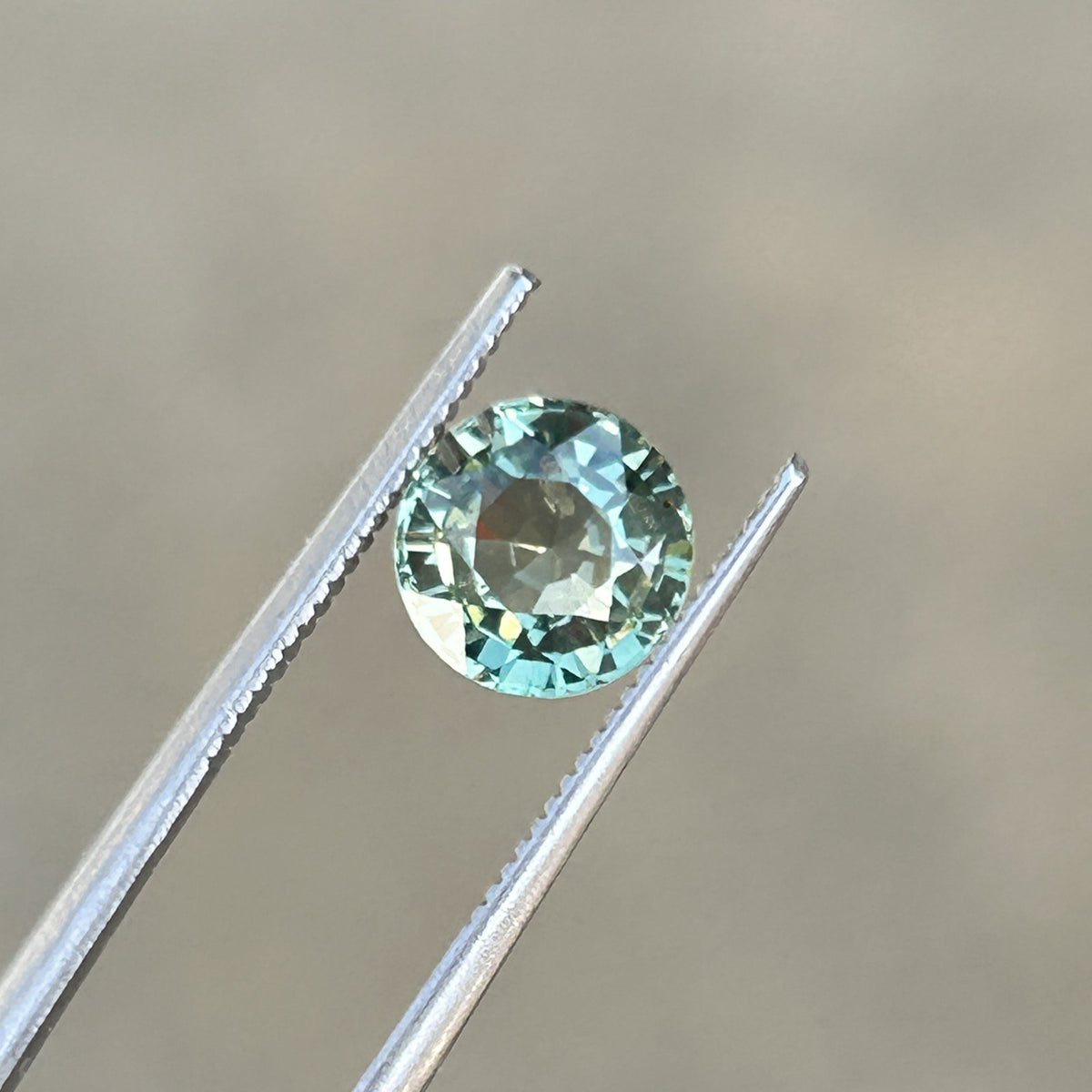 Round Brilliant Green Sapphire: 1.68 CT