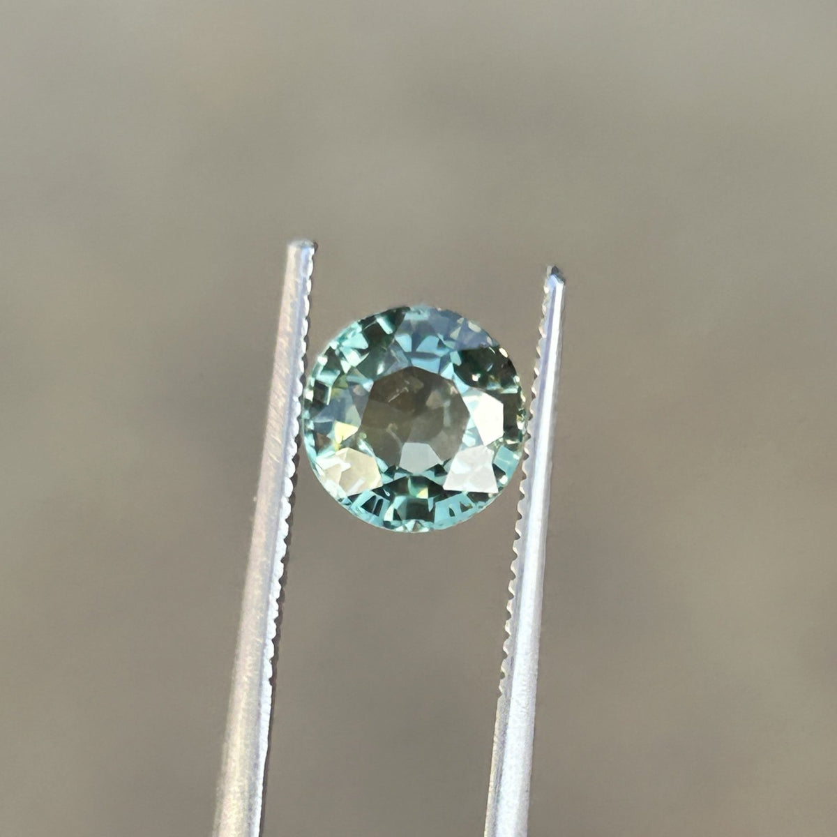 Round Brilliant Green Sapphire: 1.68 CT